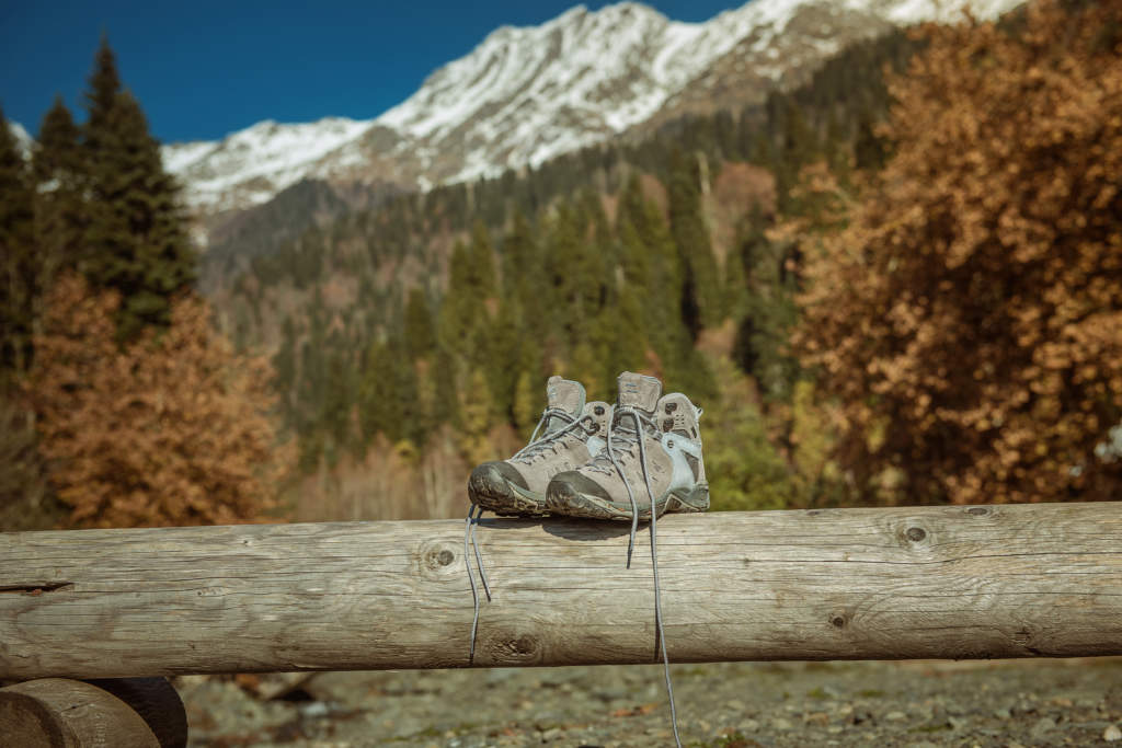 boots on a background of mountains