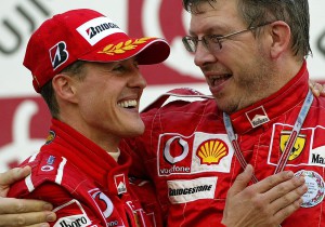 Ferrari driver Michael Schumacher, left, of Germany is congratulated by Ferrari team technical director Ross Brawn during the award ceremony of Japanese F-1 Grand Prix at the Suzuka circuit in Suzuka, central Japan, Sunday, Oct. 10, 2004. (AP Photo/Shizuo Kambayashi) COPYRIGHT SCANPIX SWEDEN Code: 436