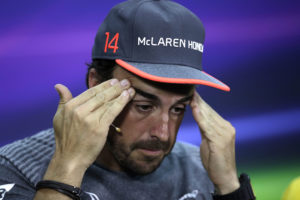 McLaren driver Fernando Alonso of Spain gives a a news conference ahead the Bahrain Formula One Grand Prix at the Formula One Bahrain International Circuit in Sakhir, Bahrain, Thursday, April 13, 2017. The Bahrain Formula One Grand Prix will take place on Sunday. (AP Photo/Hassan Ammar)