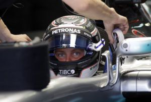 Mercedes driver Valtteri Bottas of Finland is fitted in his car cockpit for the third practice session ahead the Formula One Russian Grand Prix at the 'Sochi Autodrom' circuit, in Sochi, Russia, Saturday, April. 29, 2017. The Russian Formula One Grand Prix will be held on Sunday. (AP Photo/Sergei Grits)