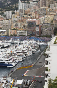 F1 racing cars take the harbor chicane during the Qualifying session at the Monaco racetrack, in Monaco, Saturday, May 23, 2015. The Formula One Grand Prix of Monaco will be held on Sunday. (AP Photo/Gero Breloer)