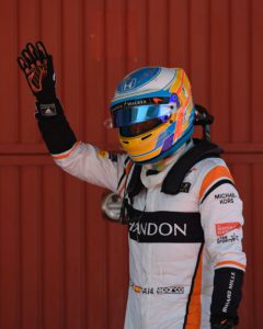 McLaren's Spanish driver Fernando Alonso waves in the parc ferme after the qualifying session at the Circuit de Catalunya on May 13, 2013 in Montmelo on the outskirts of Barcelona ahead of the Spanish Formula One Grand Prix. / AFP PHOTO / LLUIS GENE