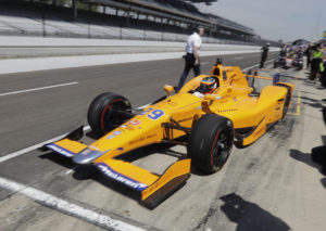 Fernando Alonso, of Spain, pulls out of the pits during a practice session for the Indianapolis 500 IndyCar auto race at Indianapolis Motor Speedway, Monday, May 15, 2017 in Indianapolis. (AP Photo/Darron Cummings)
