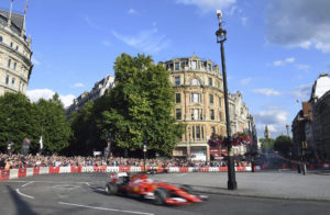 Ferrari's Sebastian Vettel drives into Trafalgar Square from Whitehall, with Big Ben's clocktower in background right, during the F1 Live event in London, Wednesday, July 12, 2017. F1 teams and cars have landed in central London for a major fan event Wednesday. (Daniel Hambury/PA via AP)