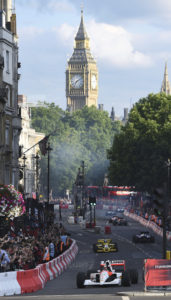 McLaren Honda's Stoffel Vandoorne, front, drives along Whitehall with Big Ben's clocktower in background, with large crowds watching during the F1 Live event along streets in central London, Wednesday, July 12, 2017. F1 teams and cars have come to central London for a major fan event Wednesday. (Daniel Hambury/PA via AP)