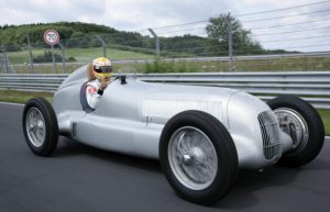 McLaren Mercedes driver Lewis Hamilton of Britain steers the W25 Silver Arrow on the old Nordschleife of the Nuerburgring on Thursday, July 9, 2009, three days prior to the German Formula One Grand Prix at the Nuerburgring racetrack, Germany. The Grand Prix will be held here on Sunday, July 12, 2009. (AP Photo/Wolfgang Wilhelm)