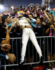 Formula One F1 - Singapore Grand Prix 2017 - Singapore - September 17, 2017 Mercedes' Lewis Hamilton celebrates winning the race REUTERS/Edgar Su