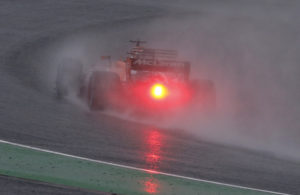 McLaren driver Fernando Alonso of Spain steers his car in the rain during the second practice session for the Japanese Formula One Grand Prix at Suzuka Circuit in Suzuka, central Japan, Friday, Oct. 6, 2017. (AP Photo/Toru Takahashi)