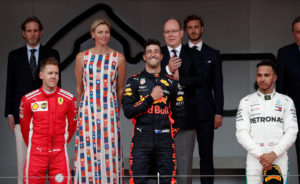 Formula One F1 - Monaco Grand Prix - Circuit de Monaco, Monte Carlo, Monaco - May 27, 2018 Red Bulls Daniel Ricciardo celebrates winning the race with Ferraris Sebastian Vettel finishing second, Lewis Hamilton who finished in third while Prince Albert II of Monaco and Charlene, Princess of Monaco look on REUTERS/Benoit Tessier