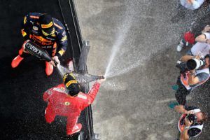 MONTREAL, QC - JUNE 10: Race winner Sebastian Vettel of Germany and Ferrari and third place finisher Max Verstappen of Netherlands and Red Bull Racing celebrate on the podium during the Canadian Formula One Grand Prix at Circuit Gilles Villeneuve on June 10, 2018 in Montreal, Canada. Mark Thompson/Getty Images/AFP == FOR NEWSPAPERS, INTERNET, TELCOS & TELEVISION USE ONLY ==