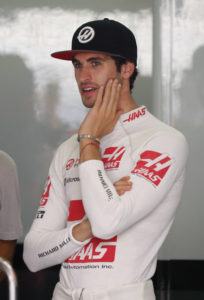 Haas reserve driver Antonio Giovinazzi of Italy stands at his team's garage during the first practice session for the Malaysian Formula One Grand Prix at Sepang International Circuit in Sepang, Malaysia, Friday, Sept. 29, 2017. (AP Photo/Vincent Thian)