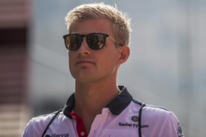 Swedish Formula One driver Marcus Ericsson of Sauber F1 Team arrives prior to the first free practice session for the Hungarian Formula One Grand Prix at the Hungaroring circuit, in Mogyorod, north-east of Budapest, Hungary, Friday, July 27, 2018. The Hungarian Formula One Grand Prix will take place on Sunday. (Zoltan Balogh/MTI via AP)