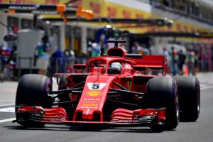 Ferrari's German driver Sebastian Vettel steers his car out of the pit lane during the first free practice session ahead of the Formula One Hungarian Grand Prix at the Hungaroring circuit in Mogyorod near Budapest, Hungary, on July 27, 2018. / AFP PHOTO / ANDREJ ISAKOVIC