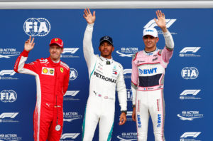 Formula One F1 - Belgian Grand Prix - Spa-Francorchamps, Stavelot, Belgium - August 25, 2018 Mercedes' Lewis Hamilton celebrates qualifying in pole position with Ferrari's Sebastian Vettel in second position and Force India's Esteban Ocon in third position REUTERS/Francois Lenoir
