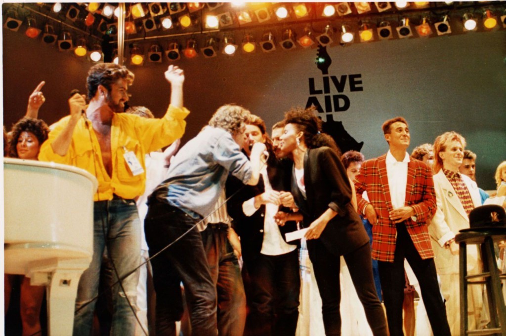 ap **file** british and irish singers perform on stage at the live aid concert at wembley stadium, london, england, on july 13, 1985. from left are george michael of wham, bob geldolf, bono of u2, freddie mercury of queen, andrew ridgley of wham! and howard jones. it may be hard for next month's live 8 concert to be as historic or even heart-warming as the 1985 live aid show, one of the greatest rock concerts of all time. (ap photo) a july 13 1985 file photo music live aid automatarkiverad
