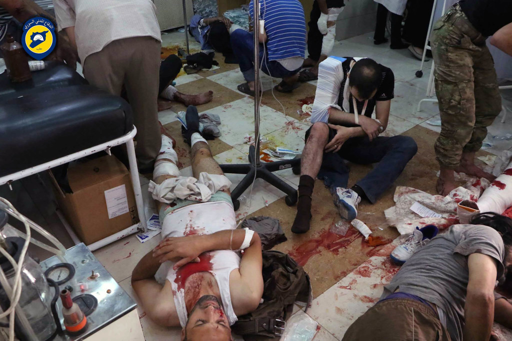 ap foto : uncredited : in this photo provided by the syrian civil defense group known as the white helmets, shows wounded men receiving treatment at a local clinic after airstrikes hit in aleppo, syria, saturday, sept. 24, 2016. syrian government forces captured a rebel-held area on the edge of aleppo on saturday, tightening their siege on opposition-held neighborhoods in the northern city as an ongoing wave of airstrikes destroyed more buildings. (syrian civil defense white helmets via ap) ap provides access to this image posted by the syrian civil defense group known as the white helmets which has been verified and is consistent with other ap reporting. logo must remain intac mideast syri automatarkiverad