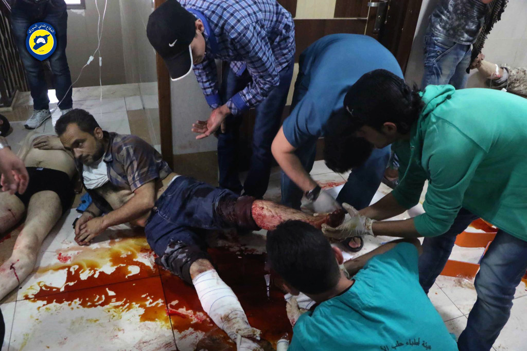 ap foto : uncredited : this photo provided by the syrian civil defense group known as the white helmets, shows victims of airstrikes receiving treatment on the floor of a clinic, in aleppo, syria, sunday, sept. 25, 2016. a broad coalition of syrian rebels denounced international negotiations for peace as meaningless on sunday, as the u.n. security council prepared to convene an emergency meeting about the spiraling violence in syria. (syrian civil defense white helmets via ap) eds note: graphic content. ap provides access to this ho image posted by the syrian civil defense group known as the white helmets which has been verified and is consistent with other ap reporting. logo must remain intac mideast syri automatarkiverad