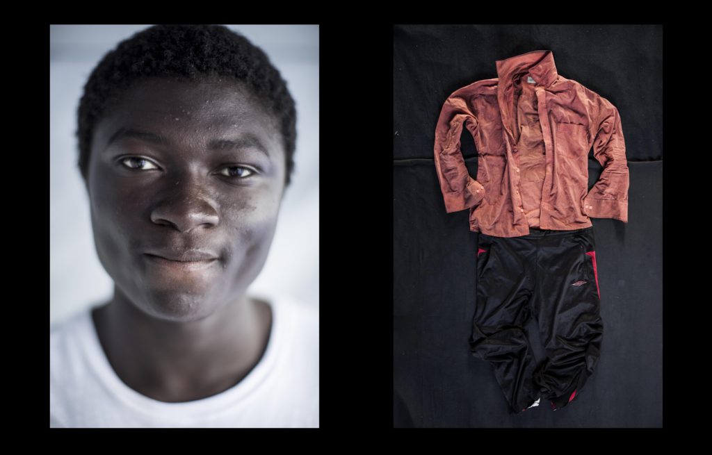 foto : narciso contreras : michael moss kaltun. sierra leone. 18 yo. aquarius sos med. july 24, 2017. michael moss fled poverty in sierra leone in 2016. he was arrested, imprisoned and got shot as he tried to escape while was being deported to sabha, in the south of libya. many of his gambian friends were killed, although he was shot he survived. after recovered from his wounds michael moss went to sabratah and dealt with traffickers. he was taken onto a dinghy boat towards europe for 250 dollars, once he reached the international waters he was rescued along with other hundreds of migrants. ??i crossed the desert from niger into libya. it?s a very difficult journey. there is a lot of people coming to the niger desert just to die. the desert is very dangerous because the heat. we did the trip by hilux trucks. the trucks speed up without stop. they stop just when there are dead people. people doing the trip in the desert need water. what is available on the trucks is not enough for all of people. thus, there are too many people