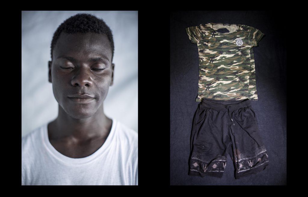 foto : narciso contreras : mohammed abdullah kemara. guinea conakry. 19 yo. aquarius sos med. july 24, 2017. mohammed abdullah was rescued with other dozens of migrants off the shore of libya on july 24, 2017. he was sold by traffickers in sabratah and sent towards europe in a dinghy boat. he fled poverty in guinea conakry when he was 17 yo. holding the wish for a better life in italy, he found himself imprisoned in a camp in libya run by traffickers for four and a half months. ??they put us in a camp and hidden us during the 4 and a half months. they threaten us of shooting if we tried to escape. one day they brought a big truck and loaded the truck with 150 people. they treated us like merchandise. they get us onto the truck and covered with a canvas. i couldn?t see anything, but they took us to the beach to board a boat??